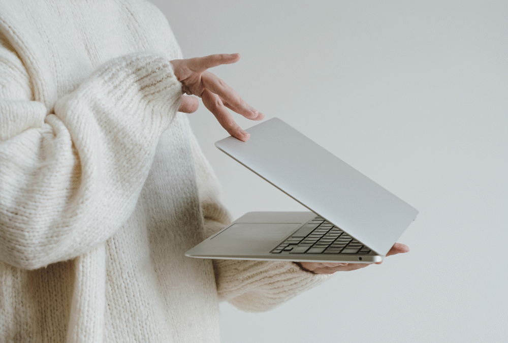 Women closes laptop. Season of uncertainty.