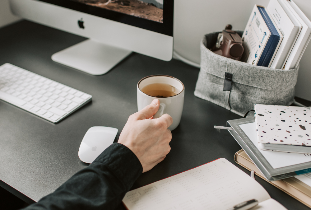 Women sitting at desk planning Q4 marketing strategy
